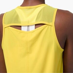 Lululemon sz 4 Lululemon Sculpt Tank
Soleil Yellow Sleeveless Women's Top slit